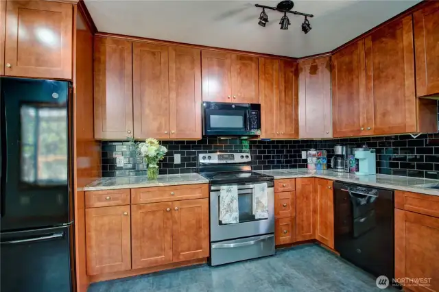 Black and stainless steel appliances.