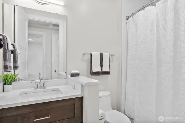 A lovely second full bath.