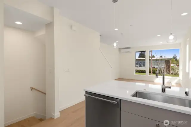 Photos of model home with similar finishes & floor plan.