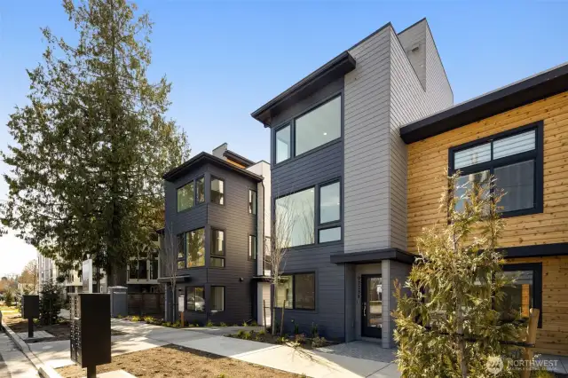 Another exterior perspective showcasing the bold, multi-tone façade and attention to modern detail.