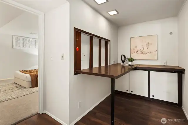 This area could be used for a craft room, office, laundry space, extra storage, or converted into a kitchenette for multi-generational living.