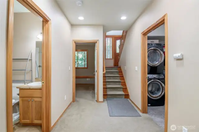 Split Entry to Lower Level, Laundry on the Right Leading to The Garage, Full Bath on Left, Lower Bedroom.
