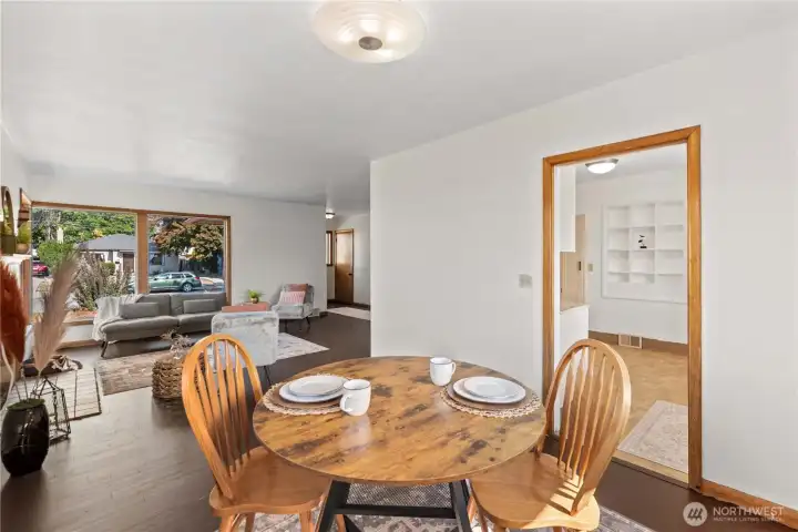 Enjoy casual meals or morning coffee in this bright dining nook that seamlessly connects to the living room, creating an open and inviting feel.