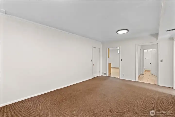 Living room, showing access to Kitchen and hallway to bathroom and bedroom
