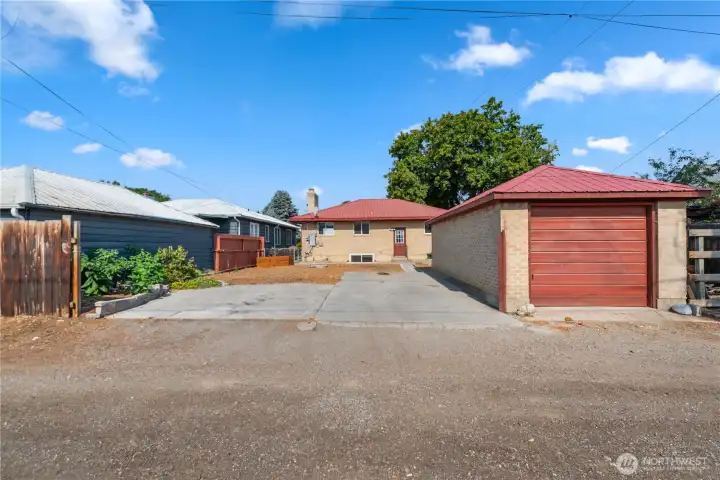 1 car garage, alley access, extra parking
