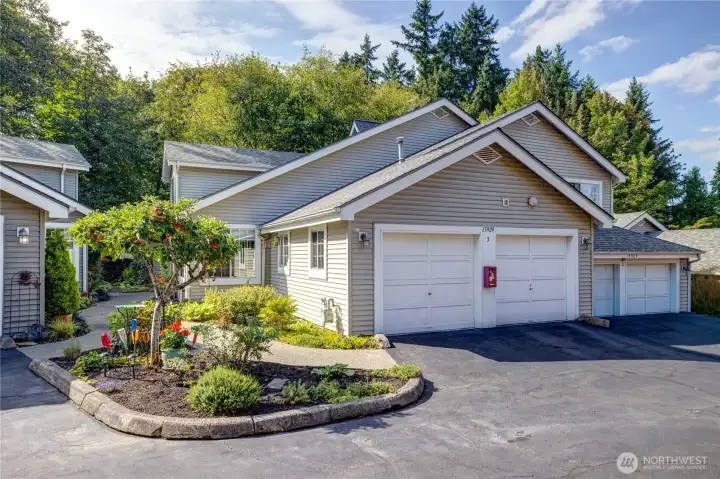 Full 2-car garage with additional storage.