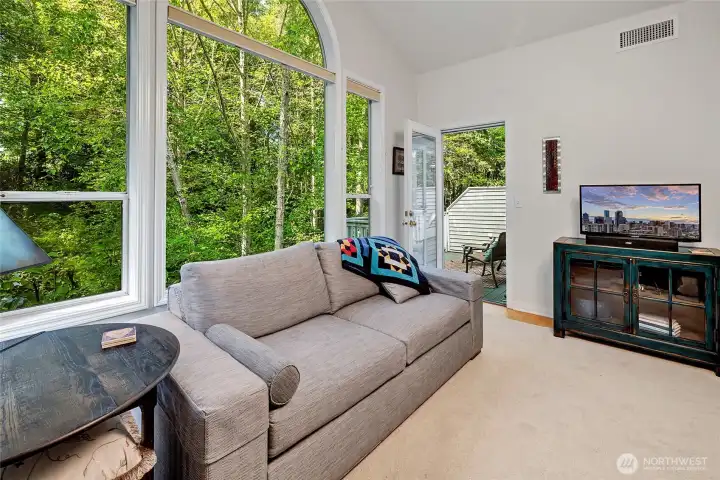 Living room with door to private deck!