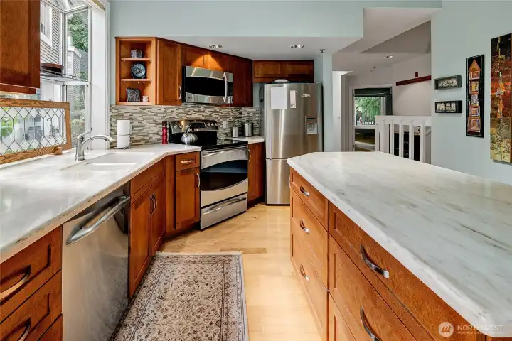 Plenty of room for multiple people in the kitchen. Large island with additional storage.