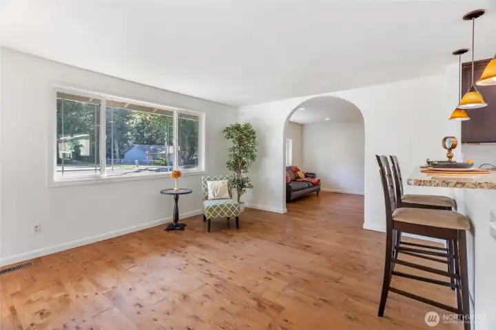 Big bright windows flood the natural light ...