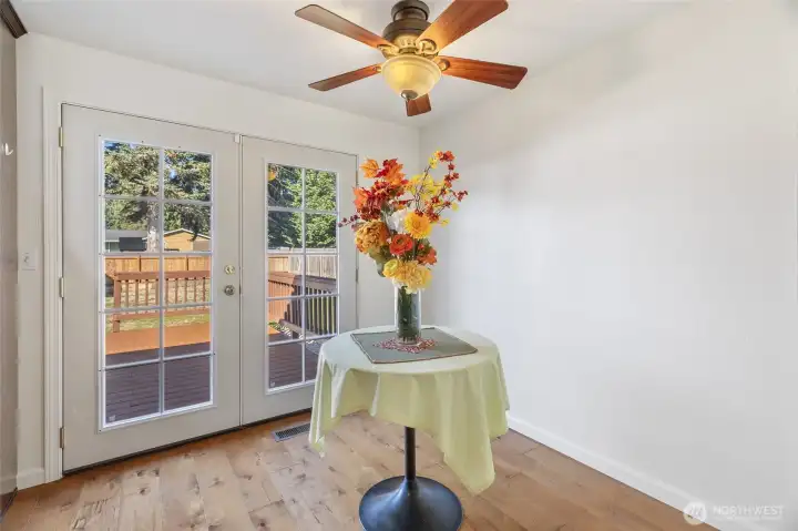 Dining area off of the kitchen leading to the french doors & the brand new deck ...