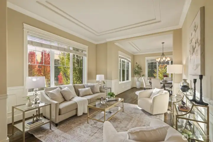 Tall ceilings and abundant windows fill every space with year-round light and views of nature.