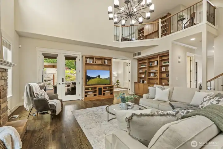 Imagine lazy mornings and cozy evenings gathered here with friends, watching movies or Kraken games, spreading holiday cheer, or flowing out to the outdoor living area.
