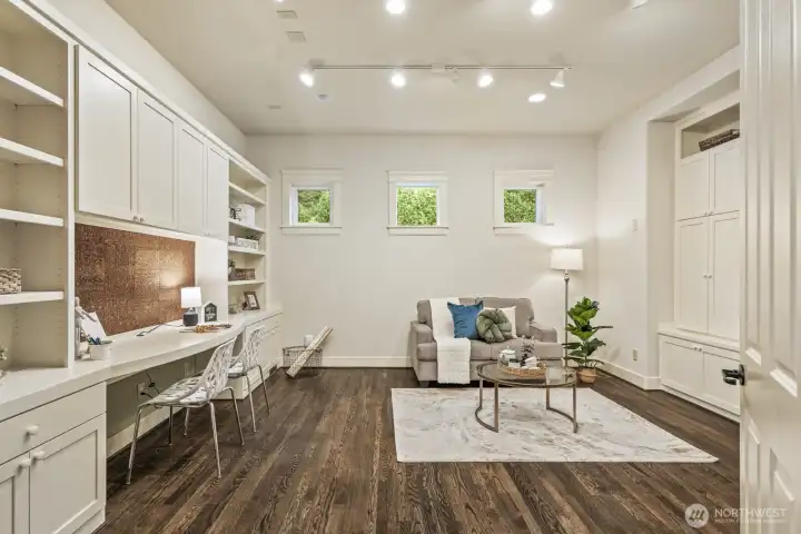 One of two offices on the main floor - use these flex spaces for remote work or learning, a guest space, a play area, a media room, or whatever else you can imagine!
