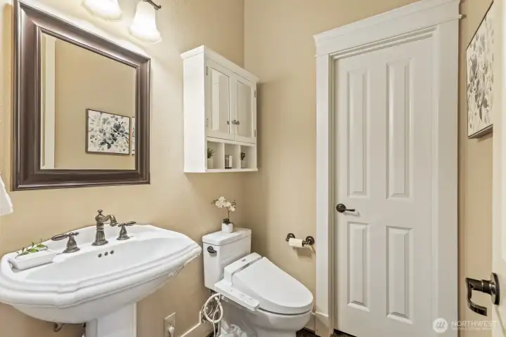 Handy half bath on the main level.