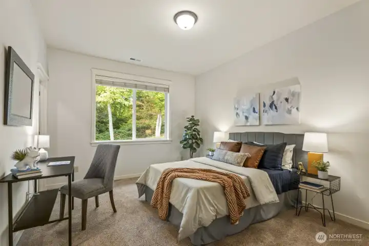 Fourth upstairs bedroom - all rooms upstairs have newer carpet (installed in 2023).