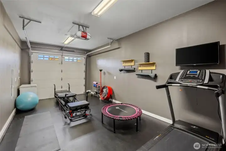 Single car garage, with entrance to the kitchen. Subs for a fitness area or extra storage.