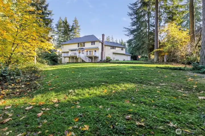 Plenty of private yard for playtime or simply enjoying the beauty of the surrounding trees.