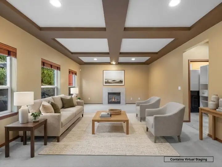 Second living space offers flexibility for entertaining, relaxing, or movie nights.