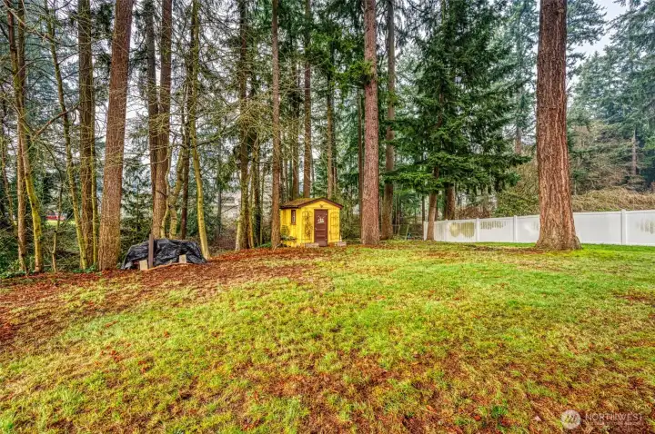 Partially fenced.  This is a deep lot that is level and then slopes down to a natural greenbelt area and creek.