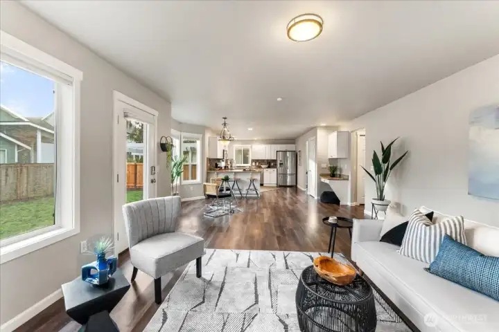 The great room is the central gathering space of the home. It offers room for informal dining, seating, and everyday living.