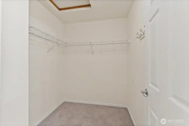 A large walk-in closet provides generous storage and organization, ideal for everyday living.