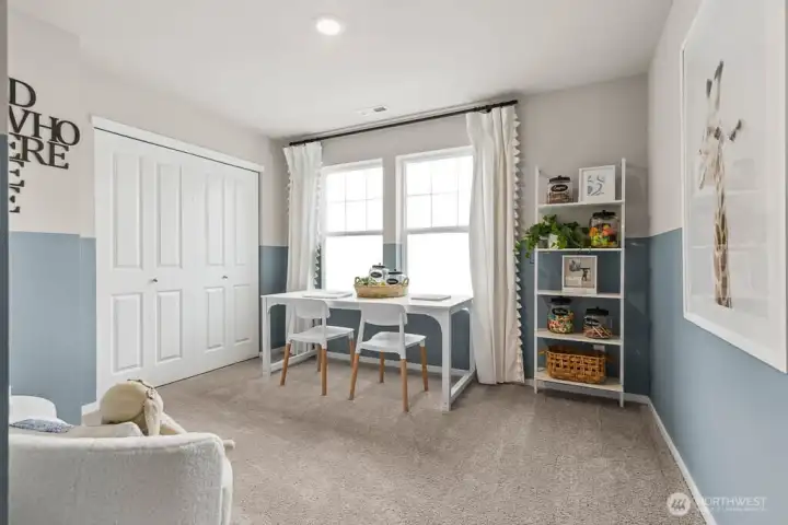 Bedroom 4. Large guest room for play space, media, or 4th sleep space. Actual home is under construction. Colors, materials, and features may vary. See site agent for details.