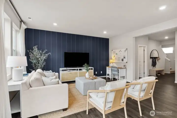 Cozy movie nights in the large great room. Actual home is under construction. Colors, materials, and features may vary. See site agent for details.