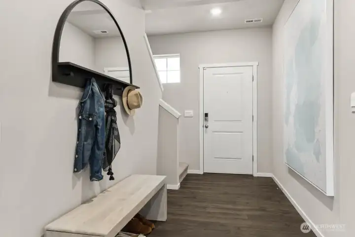 Large foyer perfect for benches and artwork. Actual home is under construction. Colors, materials, and features may vary. See site agent for details.