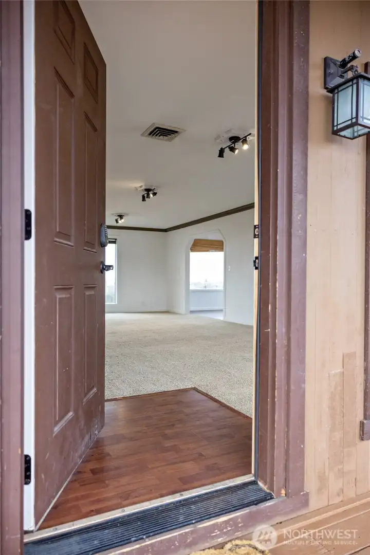 Front door leading into living room