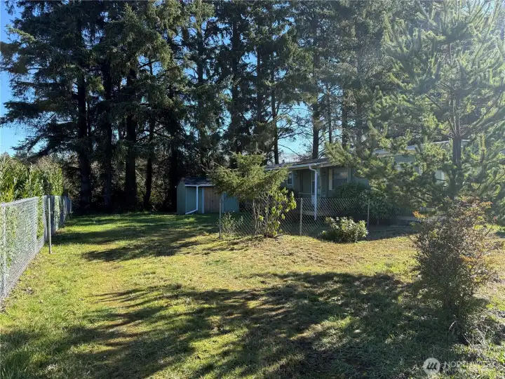 In quiet neighborhood and on a large lot for privacy.