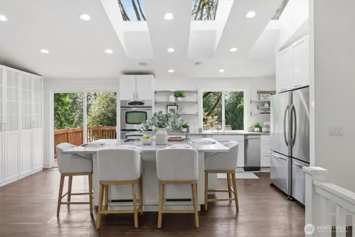 Dining area + kitchen (staged)