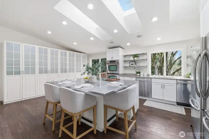 Dining area + kitchen (staged)