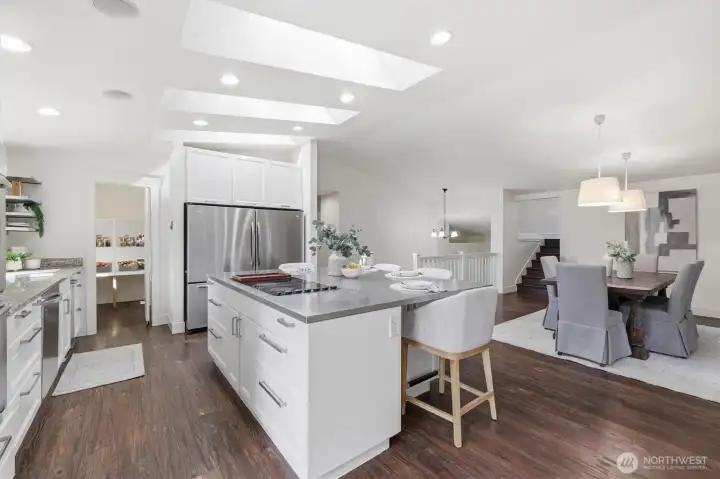 Dining area + kitchen (staged)