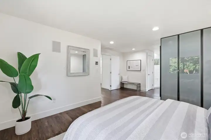 Primary bedroom + ensuite bathroom (staged)