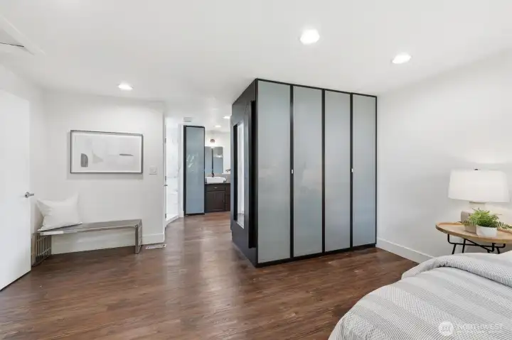Primary bedroom + ensuite bathroom (staged)