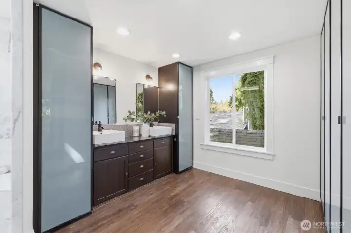 Primary bedroom + ensuite bathroom (staged)