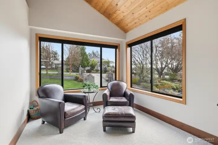 This seating area in the primary bedroom has views of Mount Rainier.