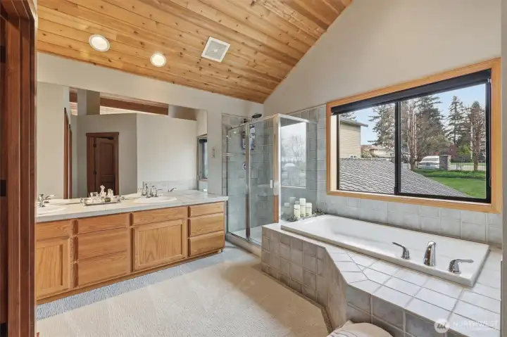 Primary suite includes this 5-piece bath as well as a large walk-in closet.