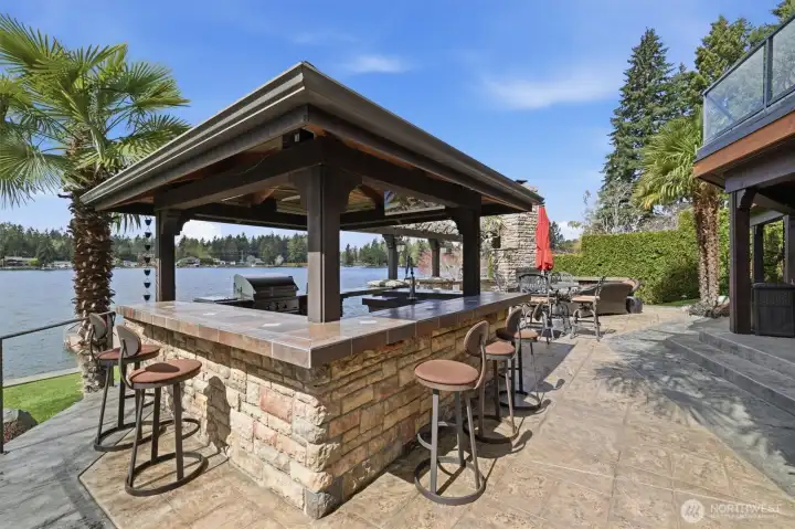 Outdoor kitchen in the cabana bar is ideal for a party!