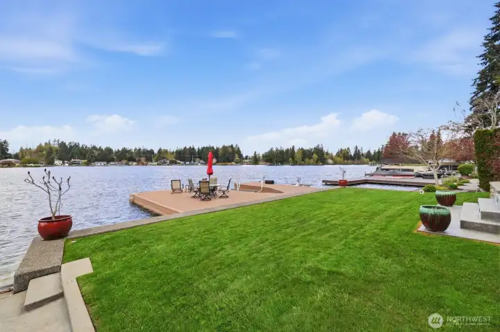 Prime low bank waterfront on wide bay near the heart of Lake Tapps.