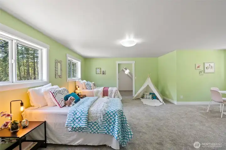 Amazing bonus room is perfect for a home gym, playroom, or homeschool room