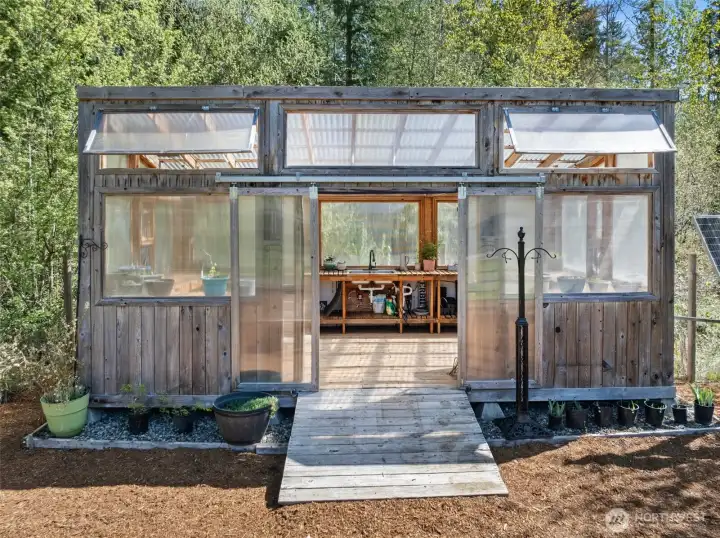 Greenhouse with solar panels