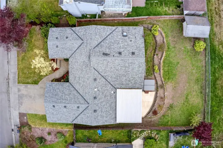 Aerial view to show the beautiful 50 year roof with transferrable warranty, replaced approximately 2011