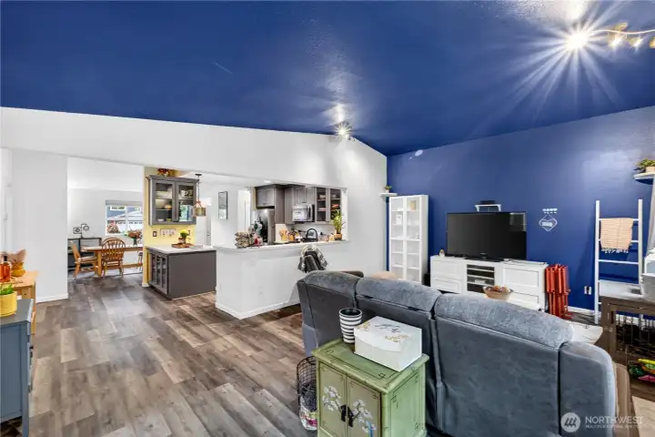 Seamless open-concept living connects effortlessly to the updated kitchen, offering ideal flow for entertaining and everyday comfort.