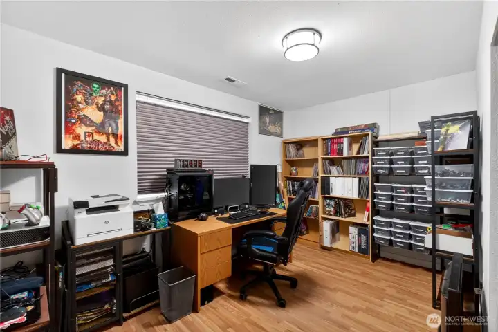 Guest bedroom with room to create, organize, and stay productive—perfect for a home office or hobby room.