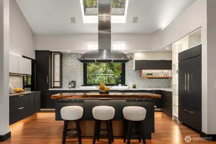 Stunning gourmet kitchen with walk-in pantry.