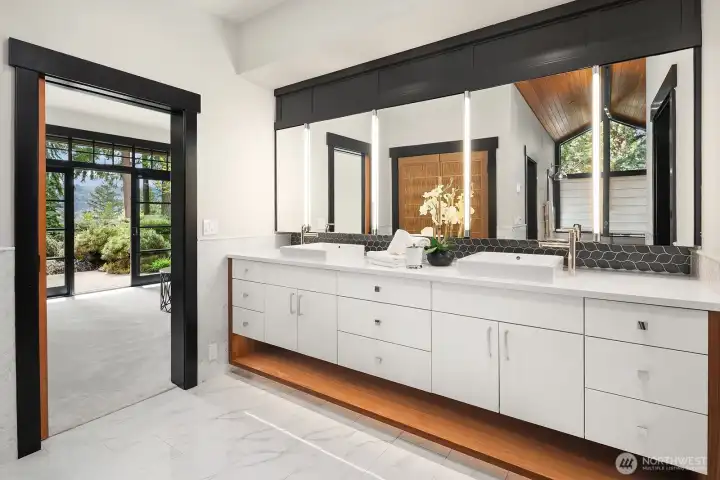 Massive spa bath with soaking tub, marble shower, and sauna.