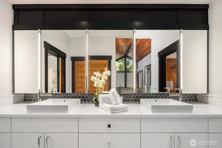 Massive spa bath with soaking tub, marble shower, and sauna.