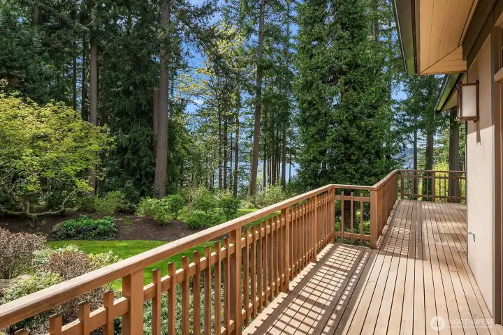 Middle bedroom with fir woodwork and view deck.