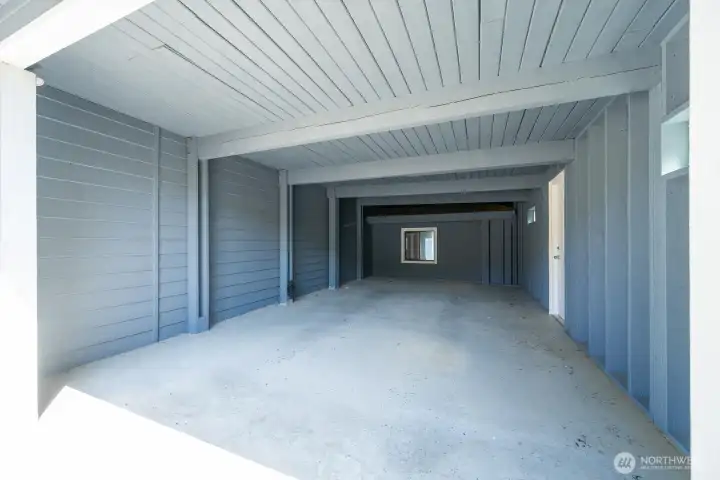 Large carport that with concrete floor. A door out to the side of home and around to back yard.